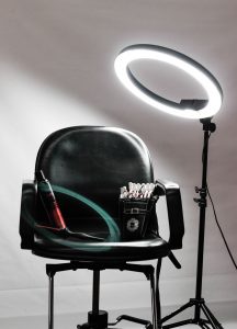 Personal stylist chair with light and make up brushes